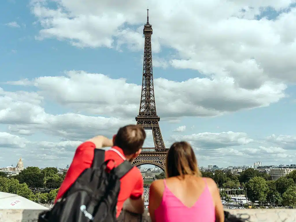 Couple at the Eiffel Tower in Paris France