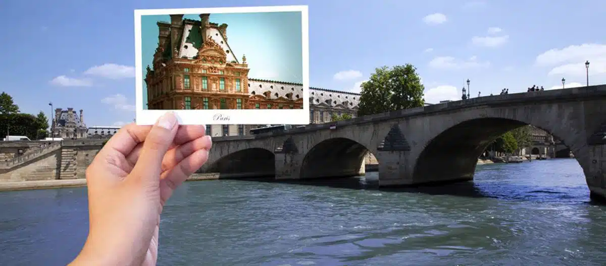 Paris Seine River Cruise passing the Louvre Museum